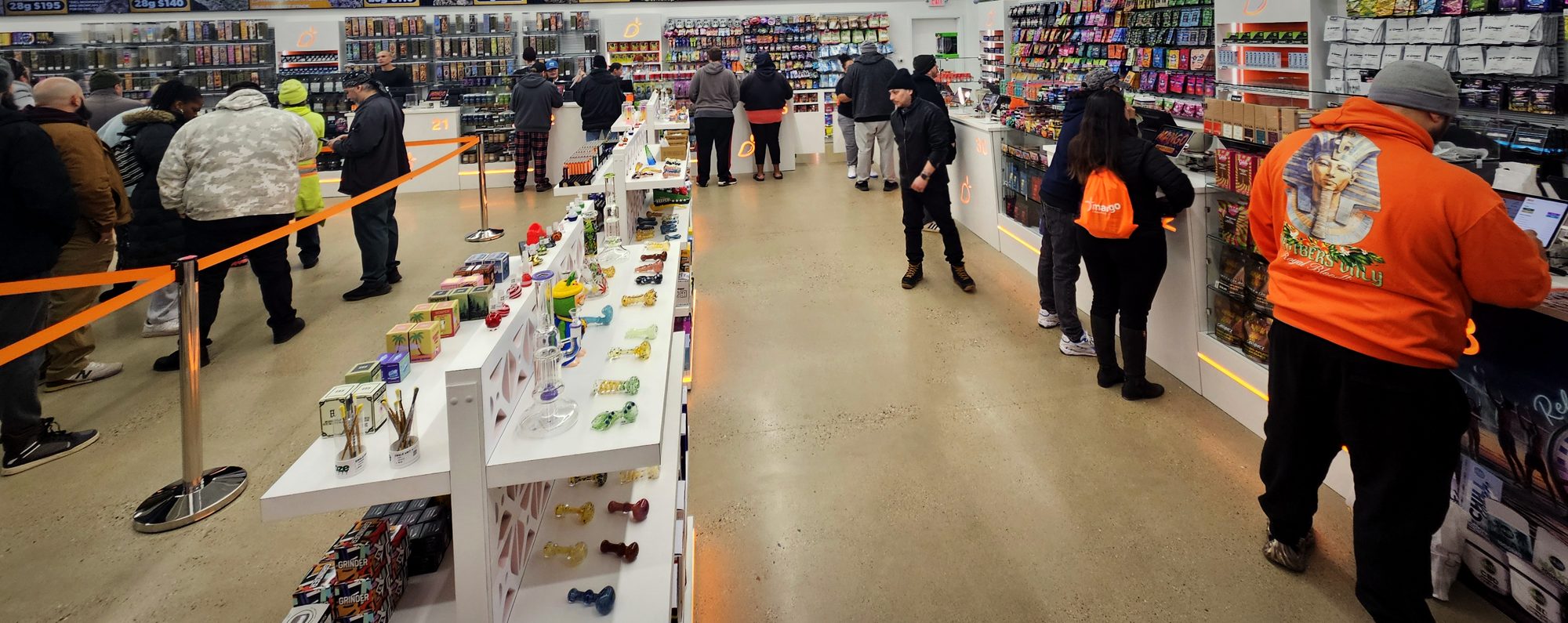 Inside Mango New Buffalo: long bright store floor with counters